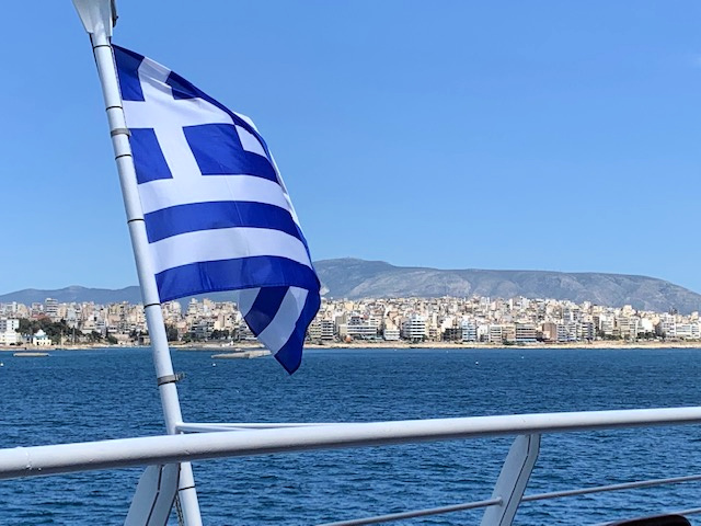 greek flag from ferry, athens coastline, karen hallam